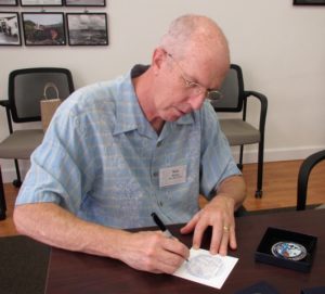 Rick signing insert card